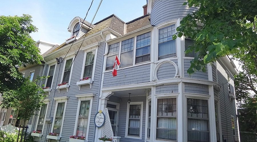 The Duchess of Kent Inn, a blue heritage home with its three-storey turret on Kent Street